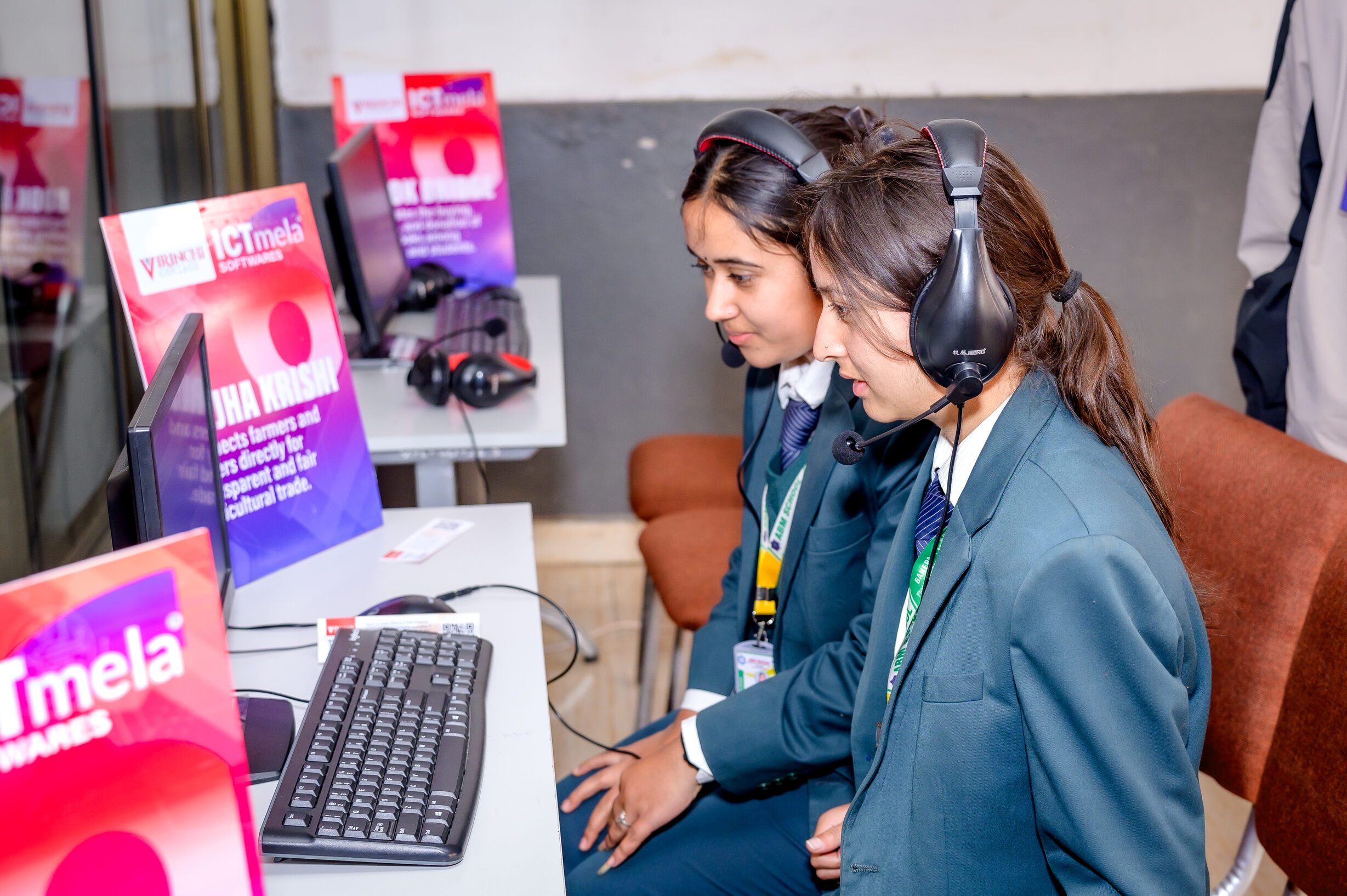 Students experiencing a live Software Development Capstone Project-Visitors exploring software project developed by Virinchians