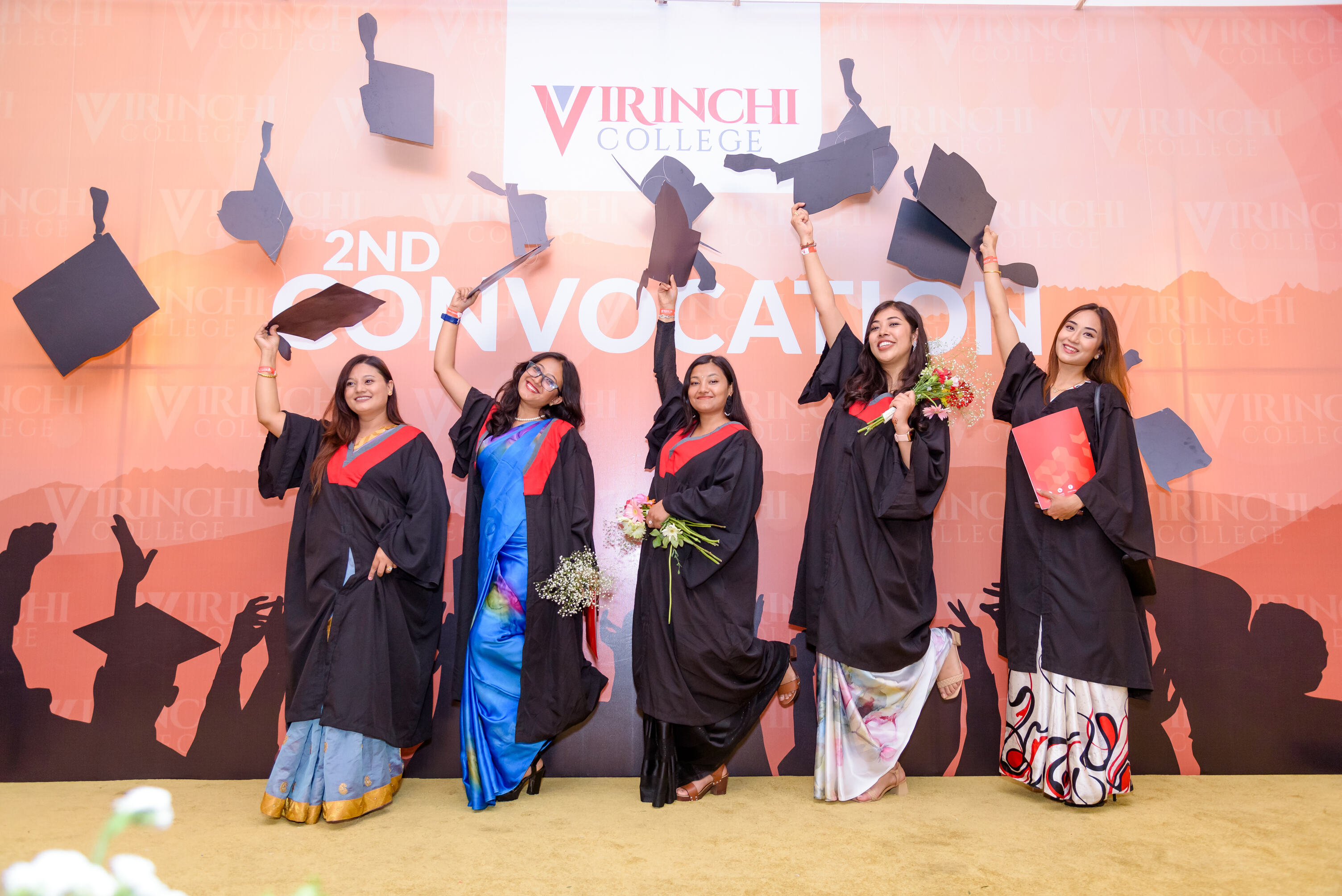 Graduates joyfully mark their achievement